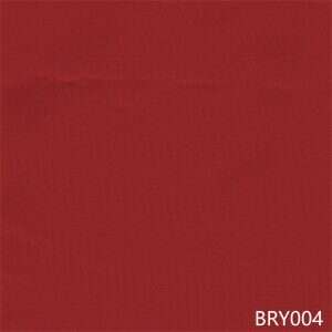 Premium Olefin solid fabric swatch in Red — outdoor cushion upholstery option