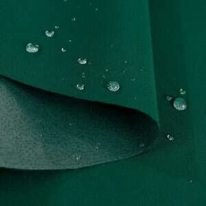 Premium Olefin solid fabric swatch in Deep green — outdoor cushion upholstery option