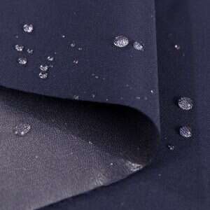 Premium Olefin solid fabric swatch in Deep blue — outdoor cushion upholstery option