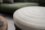 Custom bar stool cushions construction close-up — foam core, fabric and stitching detail