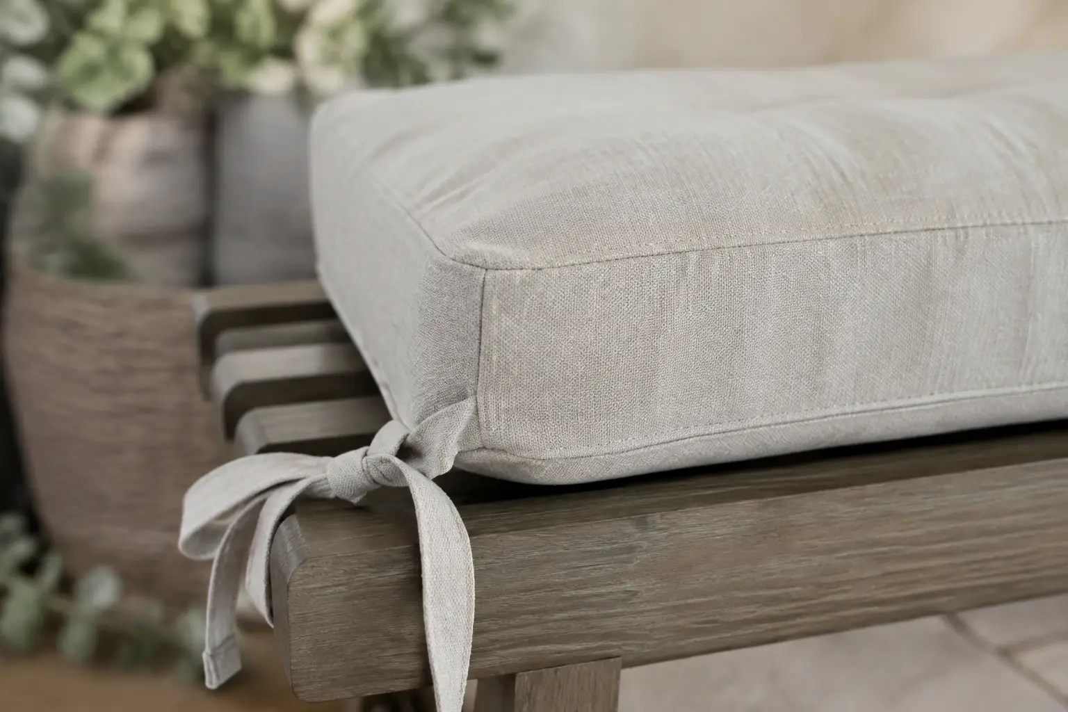 Custom bench cushions construction close-up — foam core, fabric and stitching detail