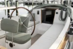 Measuring for custom boat cushions — dimensions taken edge to edge for an exact factory cut