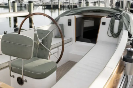 Measuring for custom boat cushions — dimensions taken edge to edge for an exact factory cut