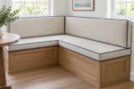Measuring for custom breakfast nook cushions — dimensions taken edge to edge for an exact factory cut