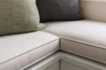 Custom breakfast nook cushions construction close-up — foam core, fabric and stitching detail