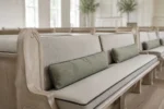 Measuring for custom church pew cushions — dimensions taken edge to edge for an exact factory cut