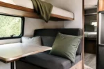 Measuring for custom camper cushions — dimensions taken edge to edge for an exact factory cut