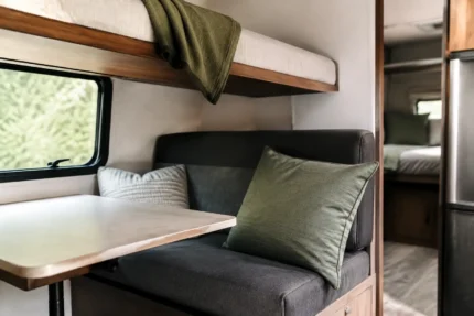 Measuring for custom camper cushions — dimensions taken edge to edge for an exact factory cut