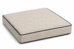 Custom seat cushions construction close-up — foam core, fabric and stitching detail