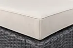 Custom wicker chair cushions construction close-up — foam core, fabric and stitching detail