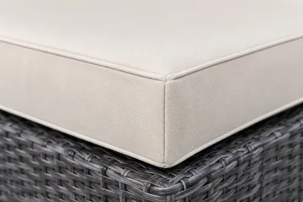 Custom wicker chair cushions construction close-up — foam core, fabric and stitching detail