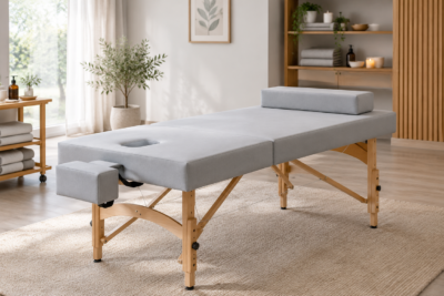 Massage studio table set with a wedge bolster and two half-round bolsters