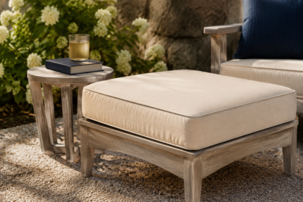Custom ottoman cushions in oatmeal woven fabric on a weathered wood ottoman frame