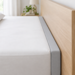 Custom bed gap filler: one rectangular foam strip pressed into the gap between mattress and headboard, top flush with the mattress