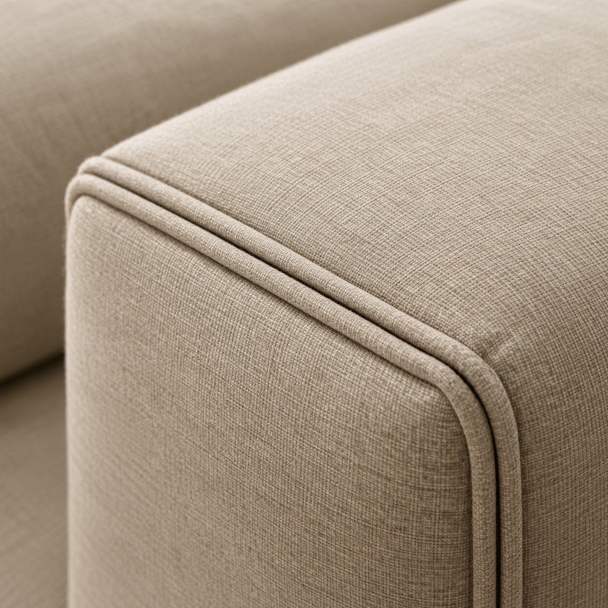 Close-up of flat knife-edge seam detail on a tailored cushion