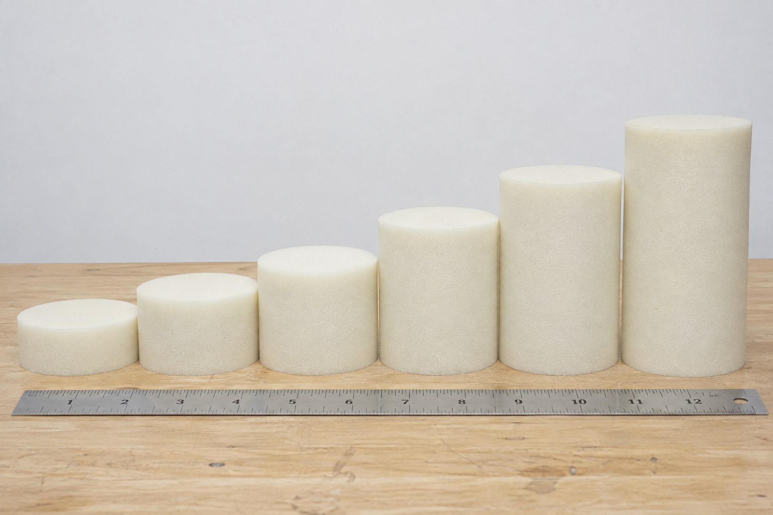 Round cushion foam cores stacked from two to eight inches thick