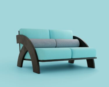 A light blue two-seater sofa with plump seat and back cushions on a dark curved wood frame - fresh firm foam inserts restore seat height