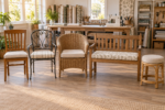 Custom cushions made to your measurements - five chairs fitted with new custom seat cushions in a bright workshop